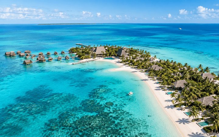 Aerial view of overwater bungalows and a turquoise lagoon near Montego Bay, Jamaica